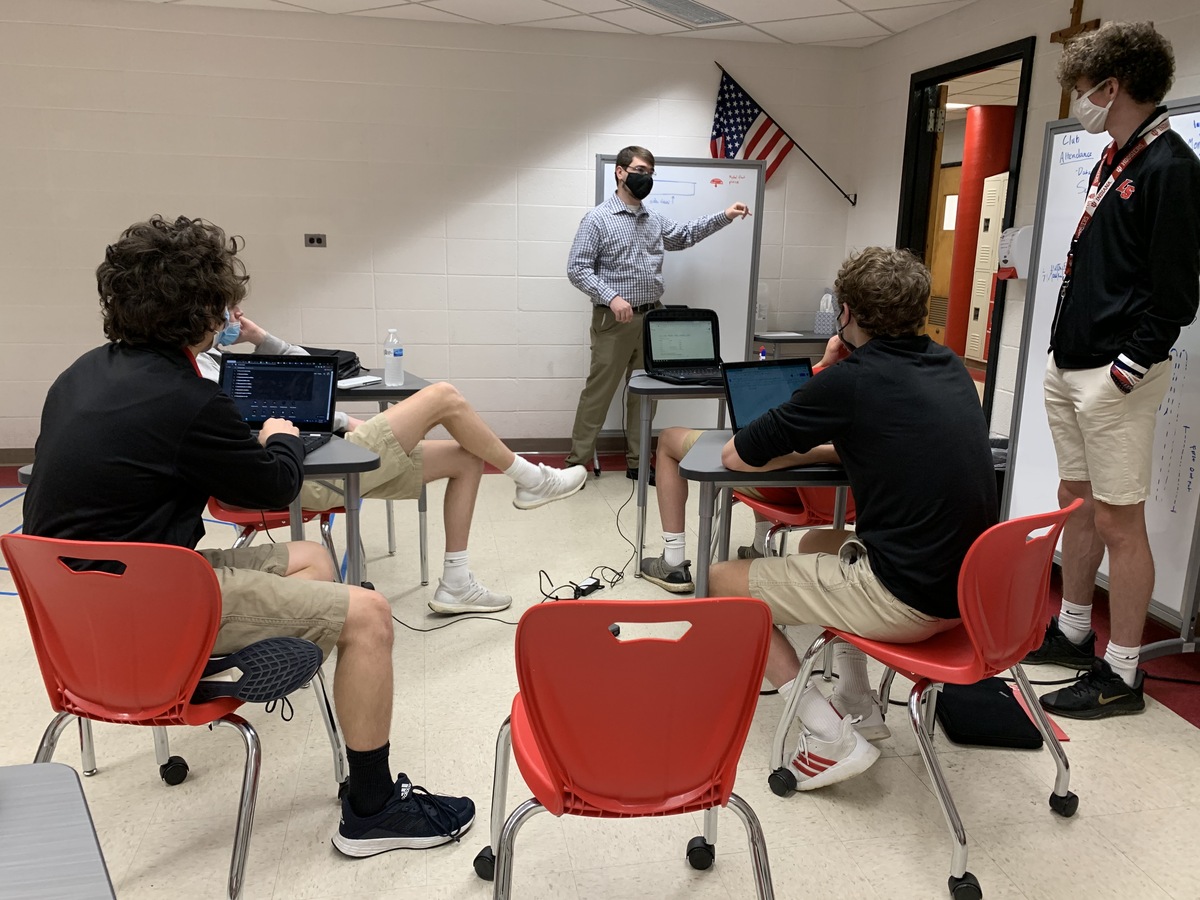 Students in classroom with laptops